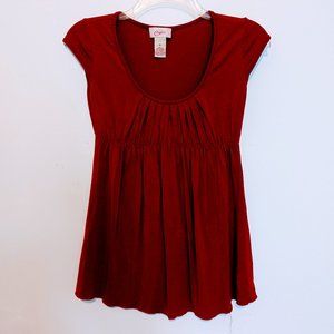 Red babydoll cap sleeve top